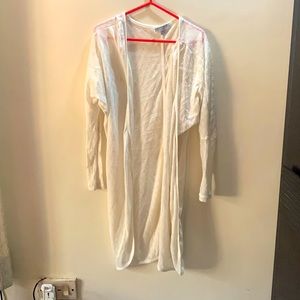White beachwear shrug